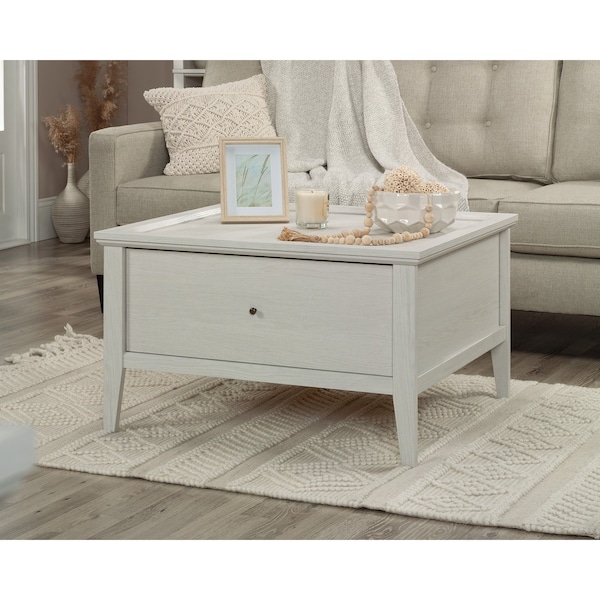 Larkin Ledge Storage Coffee Table Go , Large storage drawer features metal runners and safety stops